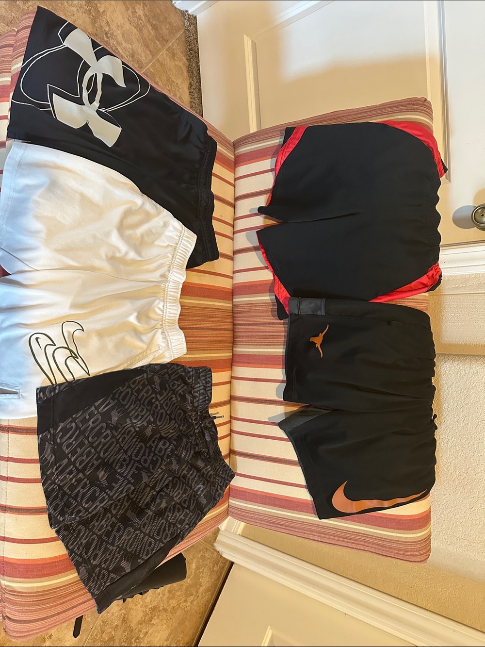Nike Kids Black Shorts with Orange Swoosh and Red-Trim Pair